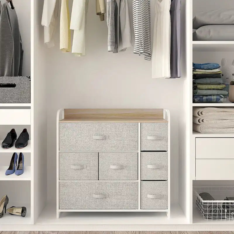 Comò a 7 cassetti | Grigio scuro / Grigio chiaro / Marrone / Rosa | Cassetti in tessuto | Struttura in acciaio | Per 1 persona